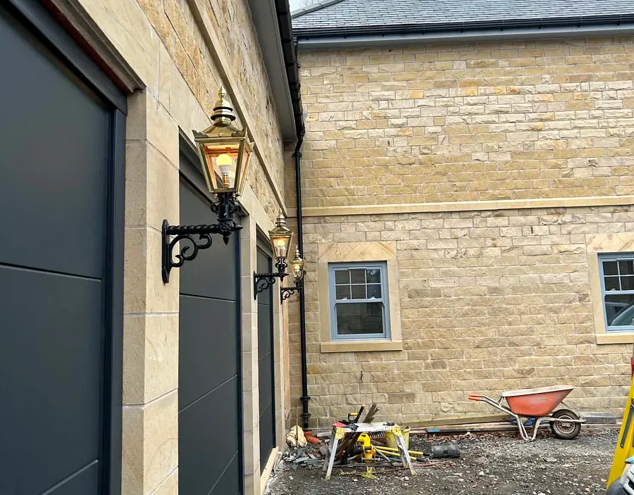Exterior wall lights installed on residential property
